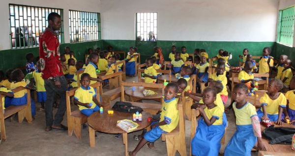 Children learn at an ECD center built by ChildFund Guinea.