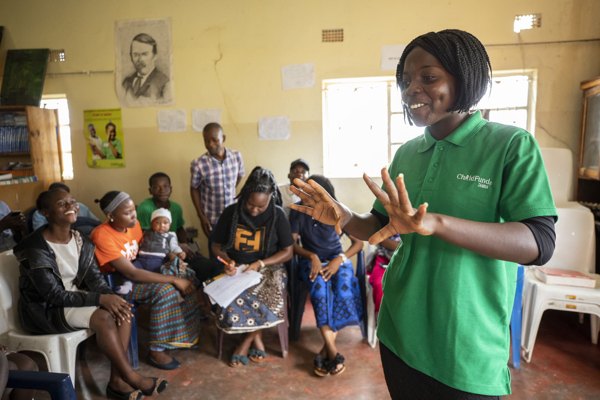 Albertina, a peer educator with ChildFund, talks to youth about the dangers of child marriage.