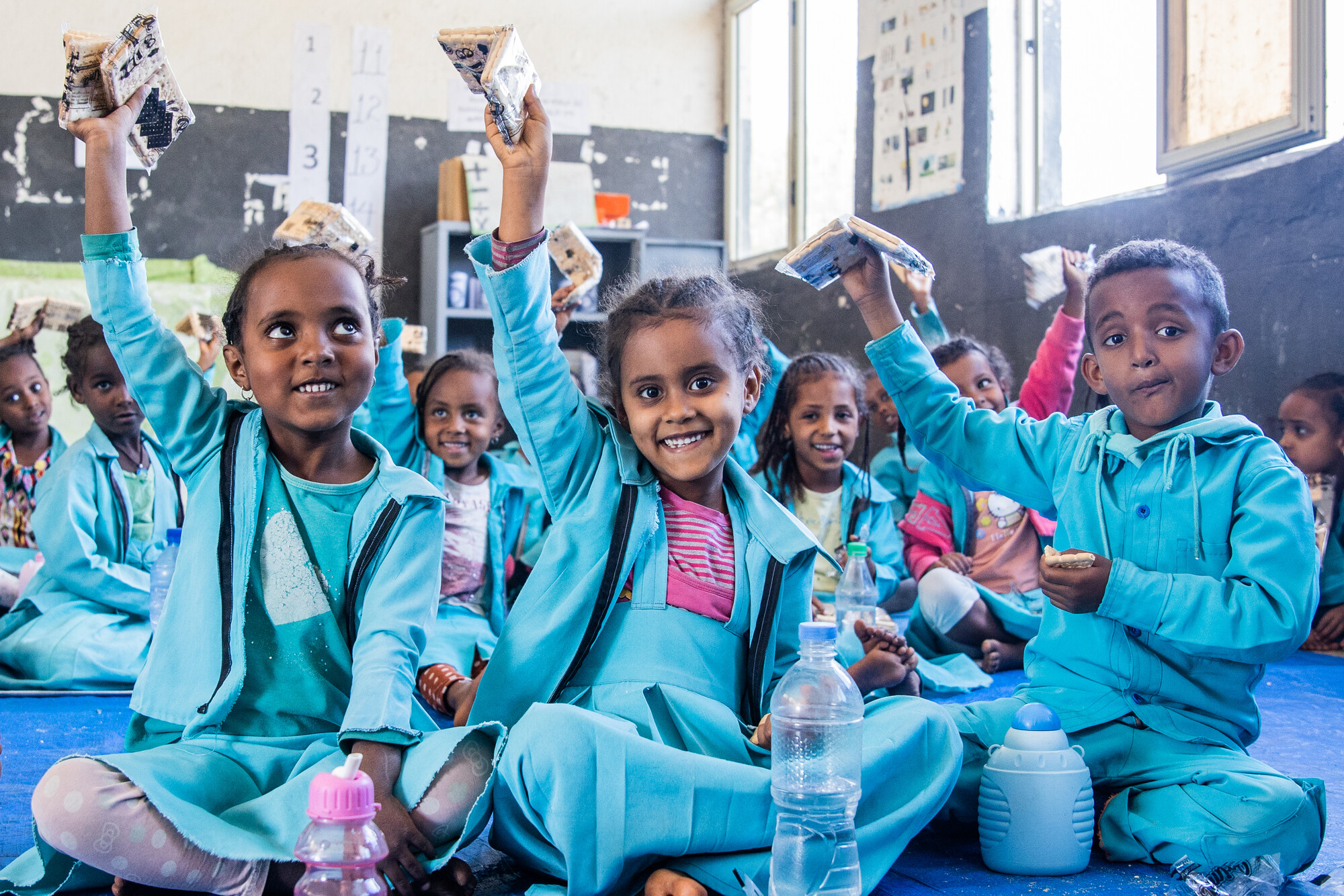 Children enjoy high-nutrition, protein-packed biscuits at a ChildFund-supported preschool in the Amhara Region as part of our emergency response to conflict in northern Ethiopia.
